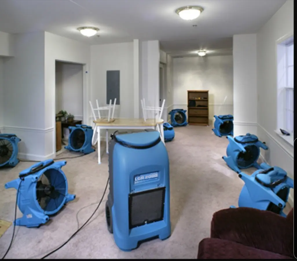 Air movers and dehumidifier setup for Water Damage Restoration in Jamestown
